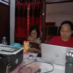 Kepala SDN 36 Manado Martha Torar Tampak Sibuk Pantau Operator IMG_20250307_084010